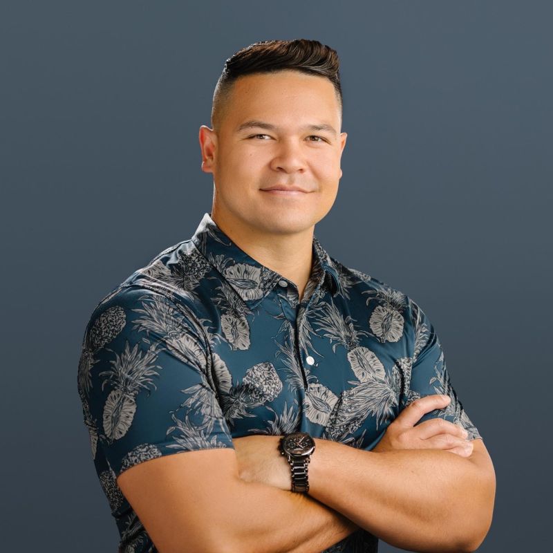 Kainoa Carlson in his dark aloha shirt